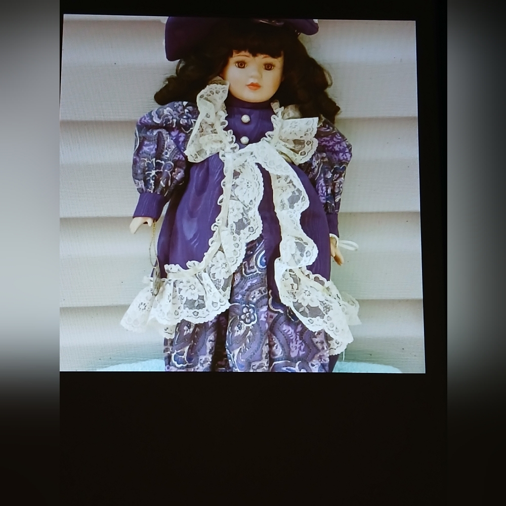 Elegant Purple Doll with Lace Details
